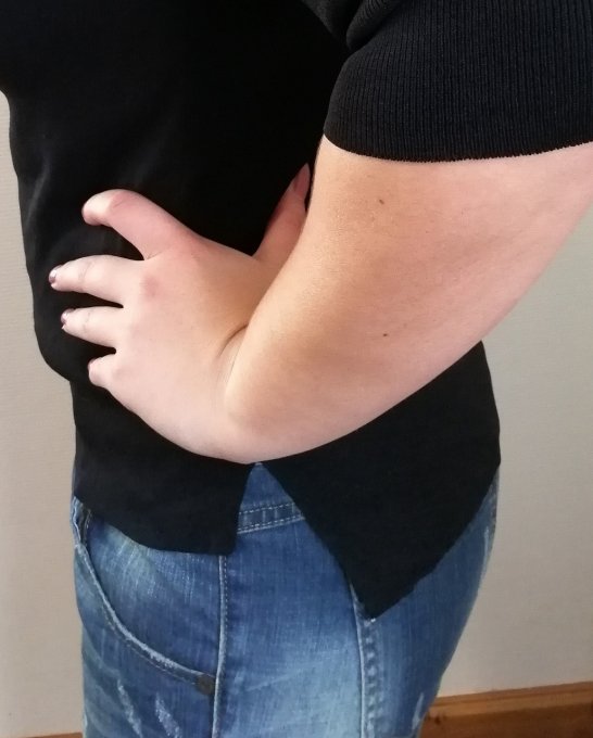 Top en maille asymétrique